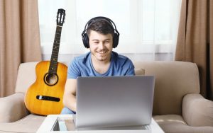Man playing guitar online